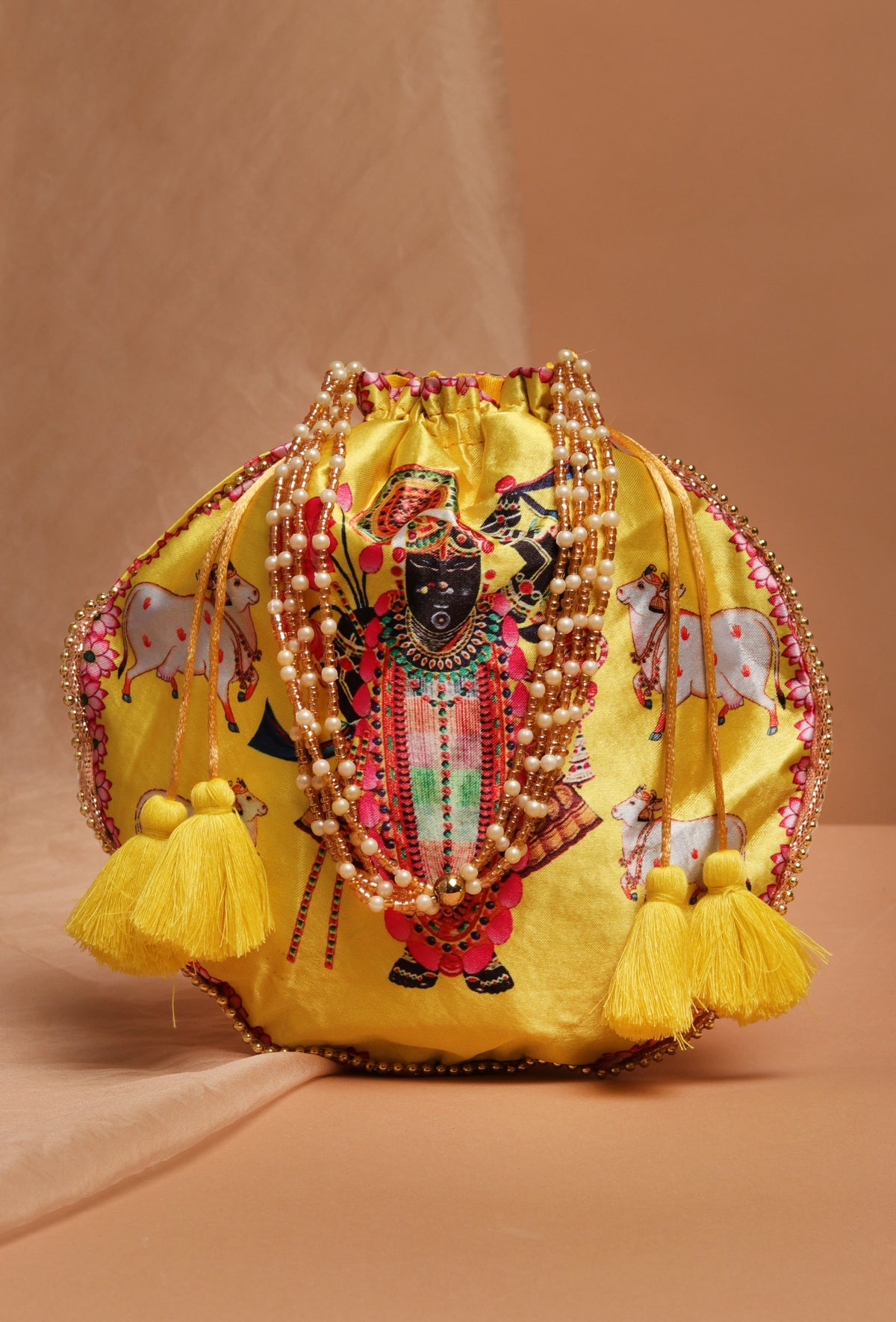 Radiant Yellow Shreenath Potli With Tassel